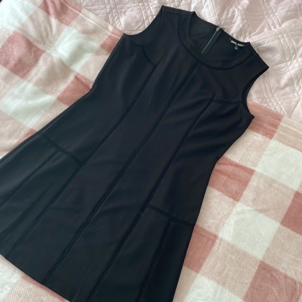 Small black cocktail dress. Zipper on the back. Worn only a few times.